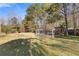 Backyard featuring a chicken coop and treehouse at 695 Old Peachtree Rd, Lawrenceville, GA 30043