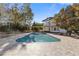 Inviting backyard pool with a spacious deck and landscaped surroundings at 695 Old Peachtree Rd, Lawrenceville, GA 30043