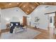 Spacious bedroom boasting hardwood floors, a vaulted ceiling, and natural light at 695 Old Peachtree Rd, Lawrenceville, GA 30043