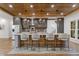 Spacious kitchen with stainless steel appliances, dark cabinets, and a large center island with bar seating at 695 Old Peachtree Rd, Lawrenceville, GA 30043