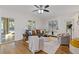 Bright living room featuring hardwood floors, neutral paint, and comfortable seating at 695 Old Peachtree Rd, Lawrenceville, GA 30043