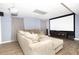 Finished basement featuring a large entertainment center, a projector, and a comfy sectional sofa at 710 Josh Ln, Lawrenceville, GA 30045