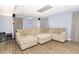 Basement with a large sectional, entertainment center, projector, and wet bar is ideal for entertaining at 710 Josh Ln, Lawrenceville, GA 30045
