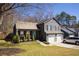 Charming two-story home with a two car garage and a well-maintained lawn at 710 Josh Ln, Lawrenceville, GA 30045