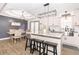 Modern kitchen featuring stainless steel appliances, granite countertops, and an island with seating at 710 Josh Ln, Lawrenceville, GA 30045