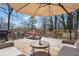A cozy outdoor seating area with a grill, perfect for backyard relaxation and enjoyment at 2518 Crestdale Se Cir, Atlanta, GA 30316