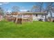 A spacious wooden deck in a private backyard is perfect for entertaining guests at 2518 Crestdale Se Cir, Atlanta, GA 30316