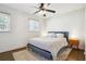 Bright bedroom with a queen bed, soft rug, and natural light from windows at 2518 Crestdale Se Cir, Atlanta, GA 30316