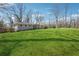 A single-story home sits on a beautifully maintained, expansive green lawn at 2518 Crestdale Se Cir, Atlanta, GA 30316
