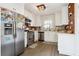 Well-lit kitchen featuring stainless steel appliances and white cabinets and countertops at 2518 Crestdale Se Cir, Atlanta, GA 30316