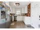 Charming kitchen with stainless steel appliances, white cabinets, and wood accents at 2518 Crestdale Se Cir, Atlanta, GA 30316
