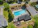 An overhead view of the community pool, playground, and patio seating at 745 Princeton Mill Run, Marietta, GA 30068