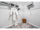 Walk-in closet with wire shelving, hanging rod, and a woven basket on the floor at 745 Princeton Mill Run, Marietta, GA 30068