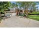 Charming two-story brick home with a two-car garage and a well-manicured front yard at 745 Princeton Mill Run, Marietta, GA 30068