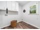 Convenient laundry room with ample storage, modern finishes, and natural light at 745 Princeton Mill Run, Marietta, GA 30068