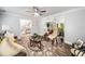 Cozy living room with a ceiling fan, hardwood floors, and an open layout at 745 Princeton Mill Run, Marietta, GA 30068