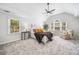 Spacious main bedroom with vaulted ceilings, a ceiling fan, and many windows with natural light at 745 Princeton Mill Run, Marietta, GA 30068
