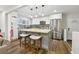 Modern kitchen with stainless steel appliances, a central island, and stylish pendant lighting at 1090 Indale Sw Pl, Atlanta, GA 30310