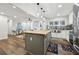 Modern open-concept kitchen featuring a stylish island and stainless steel appliances at 1090 Indale Sw Pl, Atlanta, GA 30310