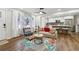 Open living space features hardwood floors and a view to the kitchen, complete with modern decor at 1090 Indale Sw Pl, Atlanta, GA 30310