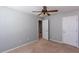 Bedroom with neutral carpet, ceiling fan, and natural light at 2877 Deerwood Sw Dr, Atlanta, GA 30331