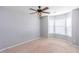 Spacious bedroom featuring a ceiling fan and a bay window offering plenty of natural light at 2877 Deerwood Sw Dr, Atlanta, GA 30331