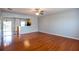 Hardwood floors and neutral walls create a seamless flow to kitchen, providing a bright and airy atmosphere at 2877 Deerwood Sw Dr, Atlanta, GA 30331