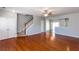 Inviting space boasts hardwood floors and seamlessly connects to other living areas, enhanced by a view of the stairs at 2877 Deerwood Sw Dr, Atlanta, GA 30331