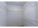 Well-organized walk-in closet with white wire shelving, providing ample storage space at 2877 Deerwood Sw Dr, Atlanta, GA 30331