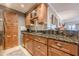 Well-appointed kitchen features granite counters and stainless steel appliances and tile floors at 3201 Lenox Ne Rd # 16, Atlanta, GA 30324