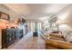 Bright living room with fireplace, French doors to a balcony, and comfortable seating at 3201 Lenox Ne Rd # 16, Atlanta, GA 30324