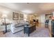 Living room includes cozy seating with an adjacent kitchen and a front door view at 3201 Lenox Ne Rd # 16, Atlanta, GA 30324
