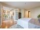 Spacious main bedroom featuring neutral decor with an attached sunroom at 3201 Lenox Ne Rd # 16, Atlanta, GA 30324