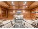 Sitting room with paneled walls, coffered ceilings, hardwood floors, and seating arrangement around a rug at 3201 Lenox Ne Rd # 16, Atlanta, GA 30324