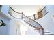 Elegant foyer view of winding staircase at 100 Annes Ln, Sharpsburg, GA 30277