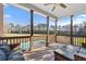 A spacious porch overlooks a pool and private backyard at 100 Annes Ln, Sharpsburg, GA 30277