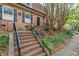 Brick townhomes featuring brick steps, wrought iron railings, and black shutters at 1261 Lavista Ne Rd # M-4, Atlanta, GA 30324