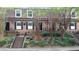 Townhomes with brick facade, wrought iron railings, and inviting front entrances at 1261 Lavista Ne Rd # M-4, Atlanta, GA 30324