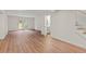 Open concept living room with new vinyl wood flooring and access to the backyard and bathroom at 1261 Lavista Ne Rd # M-4, Atlanta, GA 30324