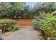 Private outdoor patio area with lush greenery and space for outdoor seating at 1261 Lavista Ne Rd # M-4, Atlanta, GA 30324