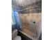 Bathroom showcasing a shower/tub combination with grab bar and safety handle for accessibility and convenience at 7503 E Cherokee Dr, Canton, GA 30115