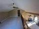 Spacious upper level loft that overlooks the great room; view of fireplace below at 7503 E Cherokee Dr, Canton, GA 30115