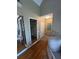 Hallway view of spiral staircase and the layout of the home's interior at 7503 E Cherokee Dr, Canton, GA 30115