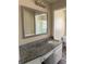 Bathroom featuring granite countertops and vanity at 3153 Lake Monroe Rd, Douglasville, GA 30135
