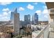 This large balcony offers panoramic city views and a glimpse of the sparkling pool below at 3324 Peachtree Ne Rd # 1510, Atlanta, GA 30326