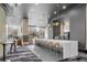 Bar area featuring a long countertop with chairs and eye catching lighting at 3324 Peachtree Ne Rd # 1510, Atlanta, GA 30326