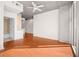 Bright, spacious room with hardwood floors, concrete ceilings, a ceiling fan, and lots of natural light at 3324 Peachtree Ne Rd # 1510, Atlanta, GA 30326
