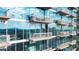Modern building facade showcases multiple balconies, offering views of the skyline at 3324 Peachtree Ne Rd # 1510, Atlanta, GA 30326
