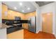Modern kitchen featuring stainless steel appliances, sleek cabinets, and hardwood floors at 3324 Peachtree Ne Rd # 1510, Atlanta, GA 30326