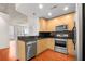 Stylish kitchen with stainless steel appliances, modern cabinets, and a view of the city at 3324 Peachtree Ne Rd # 1510, Atlanta, GA 30326